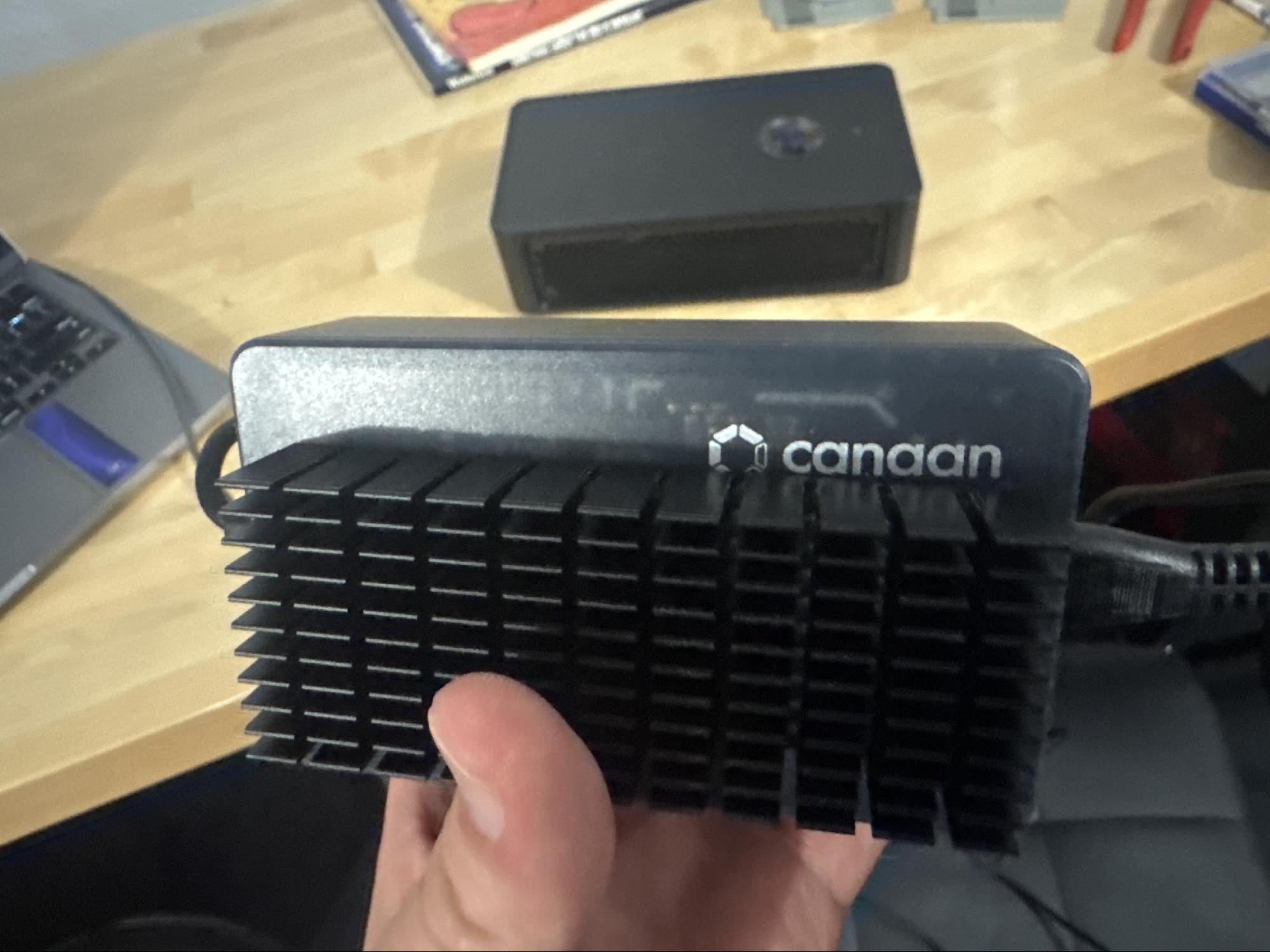 Canaan PSU with two aftermarket aluminum heatsinks attached for additional heat dissipation.